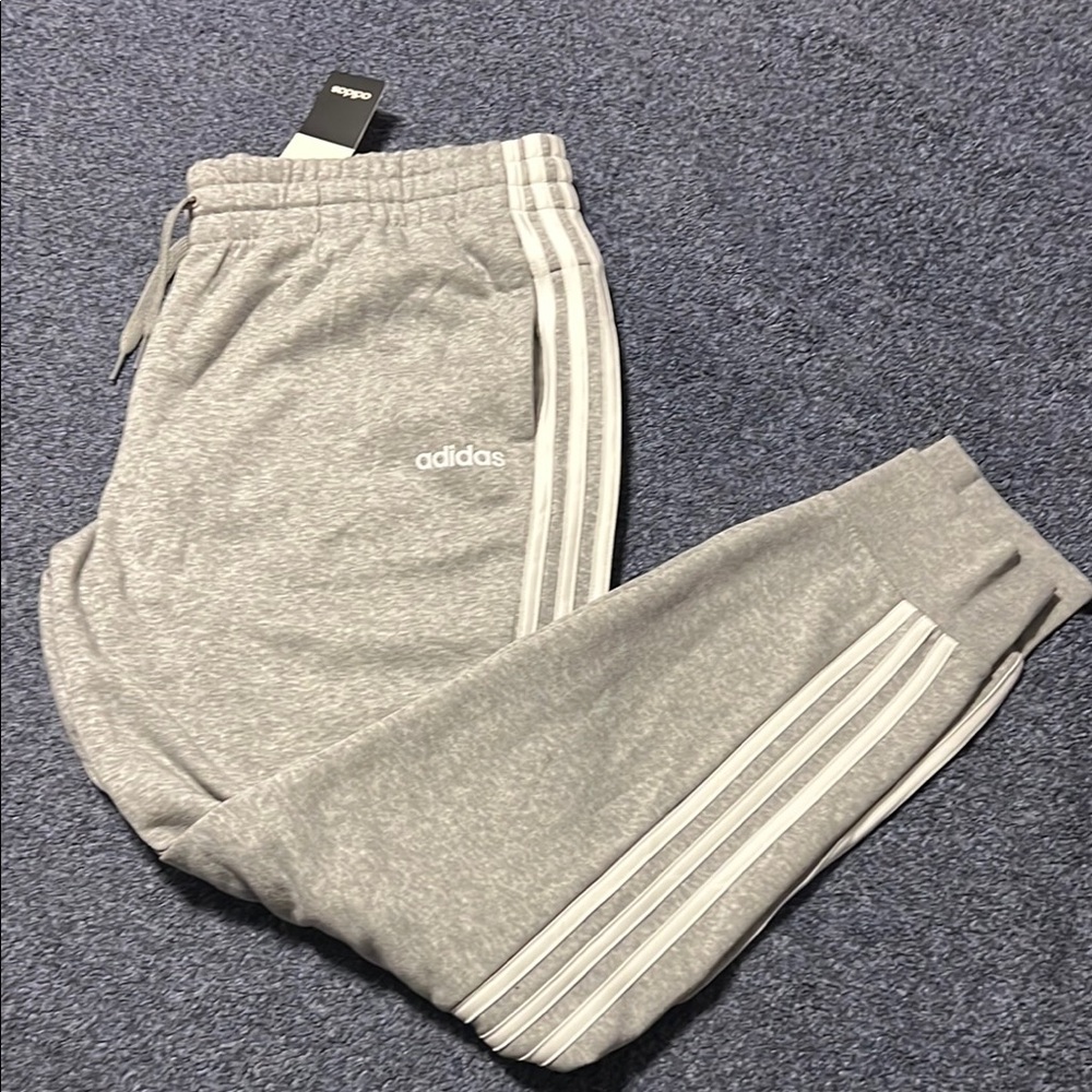 Adidas Gray Track Pants with Iconic Stripes and Jogger Style